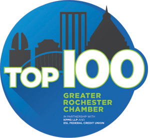 A blue circular badge with a city skyline silhouette, large white and green text reading “Top 100 Greater Rochester Chamber,” and partnership credits to KPMG LLP and ESL Federal Credit Union.