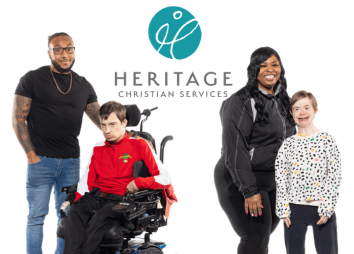 Four people pose in front of the HCS WNY logo. One man stands beside a young man in a wheelchair, while a woman stands next to a smiling girl with Down syndrome at the 30th Anniversary Celebration. All are looking at the camera.