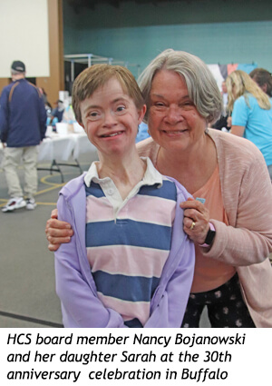 HCS board member Nancy Bojanowski and her daughter Sarah smiling together at the 30th anniversary celebration in Buffalo.
