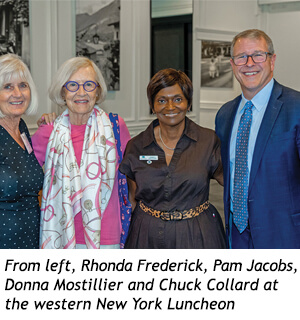 Rhonda Frederick, Pam Jacobs, Donna Mostillier, and Chuck Collard pose for a group photo at the western New York luncheon.